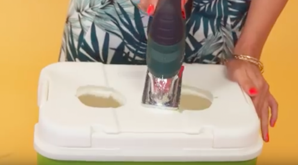 She Is Cutting Big Holes Into A Perfectly Good Cooler But The Reason