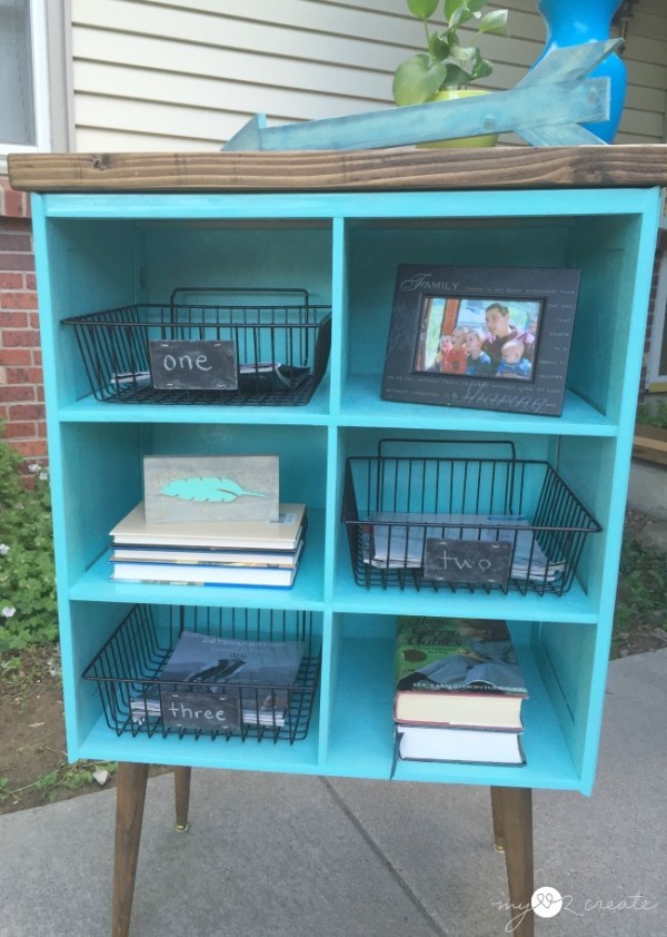 Front-view-of-shelf-with-books-and-magazines-MyLove2Create